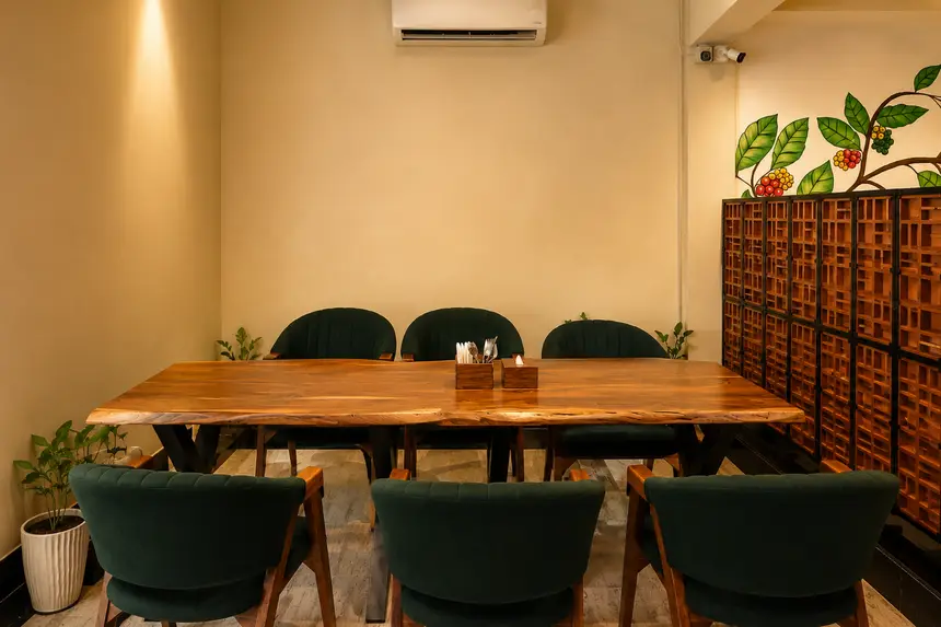 A long communal table with banquette seating