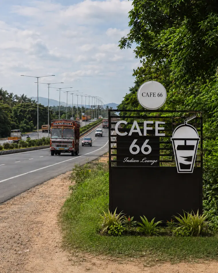 The Café 66 'Indian Lounge' sign beside the NH44 highway